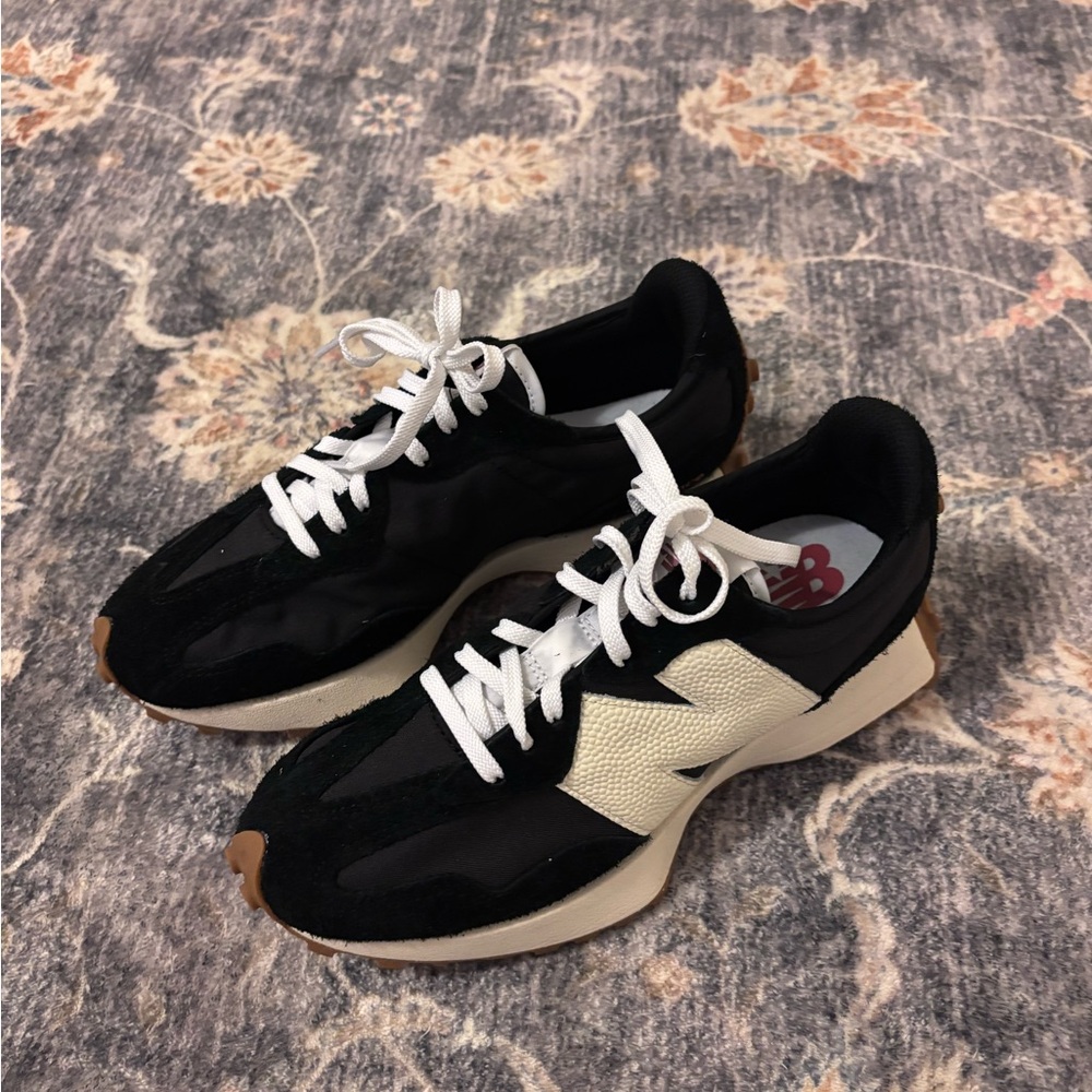Women’s Black and White New Balance 327s